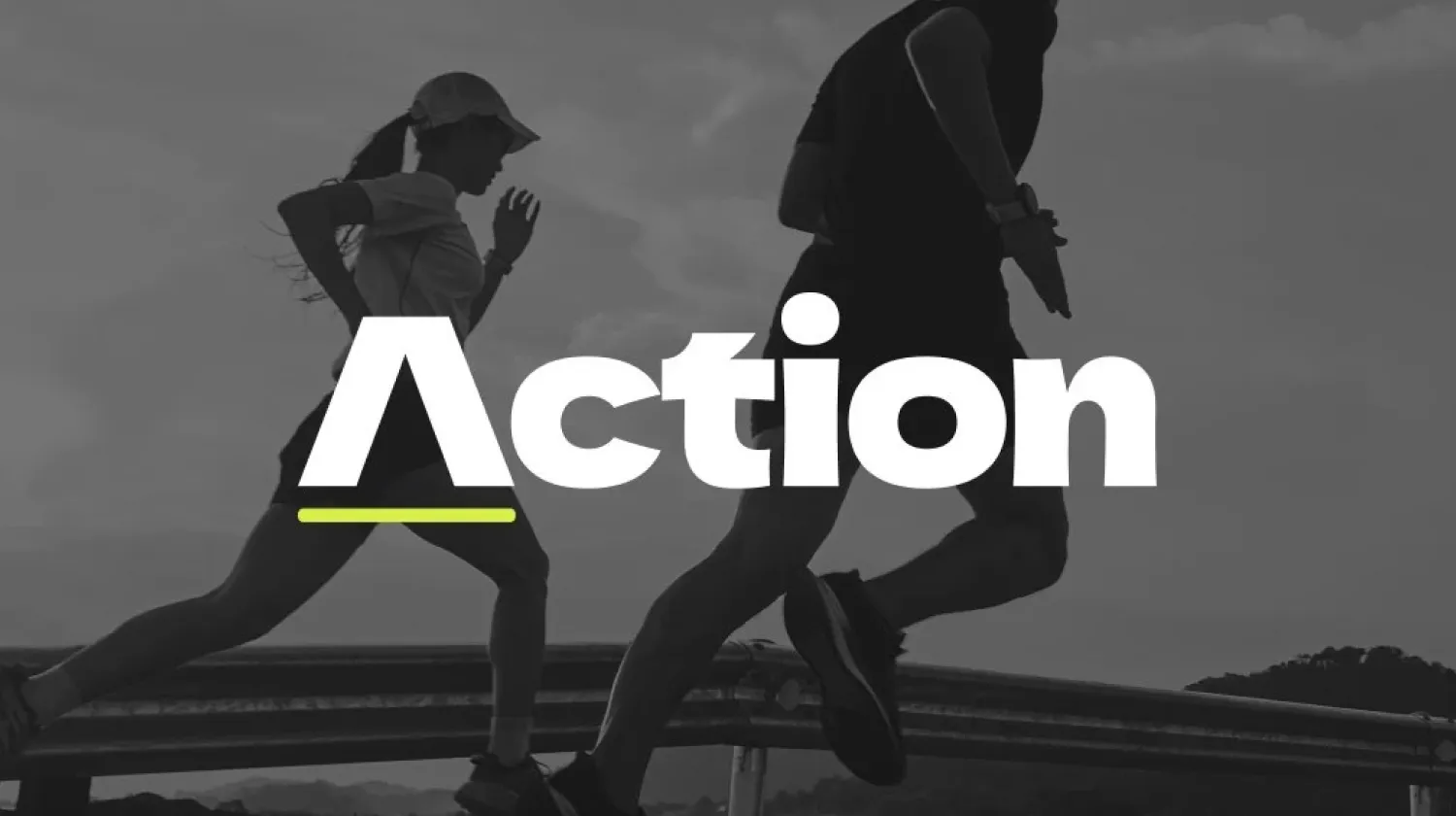 Action logo over a black and white photo of two runners